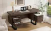 A modern office desk setup with a laptop, lamp, and books. Podgląd zdjęcia produktu