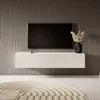 A modern living room with a wall-mounted TV and media console.