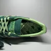 Close-up view of the inside of a green Adidas shoe. Produktbild-Vorschau