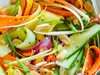 A close-up of a colorful vegetable salad with peanuts and sesame seeds. Náhľad obrázku produktu