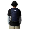 A person wearing a backpack from behind. Produktbild-Vorschau