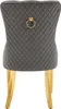 The back view of a gray upholstered dining chair with gold legs and a decorative ring on the back. Náhled obrázku produktu
