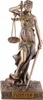 A statue of the Roman goddess of justice, Justitia, holding scales and a sword, standing on a book and a snake. Produktbild-Vorschau