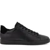 A black leather sneaker is shown from the side against a white background. Voir les images du produit
