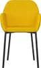 A yellow velvet dining chair with black metal legs, shown from the front against a white background. Náhled obrázku produktu