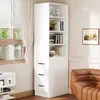 A white bookshelf with drawers is placed next to a brown leather sofa in a room with a window and curtains. Anteprima dell’immagine prodotto