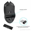 The underside of a black wireless mouse is shown, with labels pointing out the battery compartment and the USB receiver storage. Podgląd zdjęcia produktu