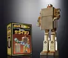 A golden robot figure and its packaging are displayed against a dark background. Produktbild-Vorschau