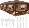 A long, brown gazebo with a printed image of a wooden chalet facade, including windows and stacked firewood. Below the gazebo are metal stakes and white ropes, likely accessories for assembly. Voir les images du produit