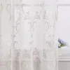 A close-up view of a sheer curtain with a damask pattern. Produktbild-Vorschau