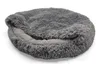 A round, gray, fluffy pet bed is shown from a diagonal angle on a white background. Produktbild-Vorschau