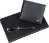 A black leather wallet, a black notebook, and a black pen are arranged on a white background. Produktbild-Vorschau