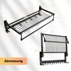 A collage showing a black metal shelf unit with hooks, both from a front perspective and a folded-down perspective, with dimensions indicated. The word "Abmessung" (German for "Dimension") is visible in an orange box. Náhľad obrázku produktu