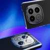 Two transparent phone cases with camera modules are shown against a gradient blue and purple background. Podgląd zdjęcia produktu
