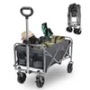 A folded and unfolded camping wagon filled with various items. Produktbild-Vorschau
