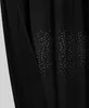 A close-up view of a black curtain with a shimmering pattern of silver dots. Podgląd zdjęcia produktu
