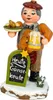 A wooden figurine of a man holding a plate of food and a mug of beer, standing in front of a chalkboard sign. Produktbild-Vorschau