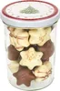 A glass jar filled with star-shaped chocolates, some white and some brown, with a festive Christmas lid. Anteprima dell’immagine prodotto
