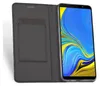 A black flip case for a Samsung Galaxy A7 2018 is shown open, revealing a smartphone with a colorful wallpaper. Produktbild-Vorschau