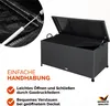 A black rattan storage box with its lid open, showing a gas strut mechanism. Text overlays describe features. Produktbild-Vorschau
