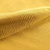 A close-up view of a yellow fabric with a textured striped pattern. Náhled obrázku produktu