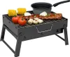 A portable charcoal grill with food items on it. Produktbild-Vorschau