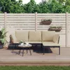 An outdoor lounge set with beige cushions is placed on a wooden deck, with a slatted fence and greenery in the background. Anteprima dell’immagine prodotto