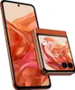 A Motorola Razr 50 smartphone, shown in both its open and closed states, with a vibrant orange background. Produktbild-Vorschau