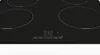 A close-up, top-down view of a black induction cooktop with four heating zones and control buttons. Produktbild-Vorschau