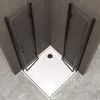 A corner shower stall with open glass doors, a white shower tray, and gray tiled walls. Produktbild-Vorschau