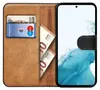 A book-style phone case with slots for cards and cash, showing a Samsung Galaxy S23 Plus phone inside. Anteprima dell’immagine prodotto