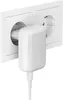 A white Belkin charger plugged into a white double electrical outlet. Anteprima dell’immagine prodotto
