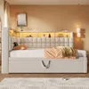 A bedroom scene featuring a daybed with storage and a headboard with integrated lighting. Anteprima dell’immagine prodotto