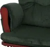 Close-up view of the armrest and seat cushion of a green corduroy armchair with wooden accents. Podgląd zdjęcia produktu