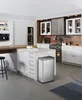 A modern kitchen with a central island and various appliances. Produktbild-Vorschau