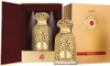 A product shot of two perfume bottles in a box, with the product box in the background. Anteprima dell’immagine prodotto
