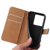A hand holding a black flip phone case with a brown interior and card slots. Produktbild-Vorschau