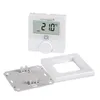 A white digital thermostat with a screen displaying '21.0°C' and 'AUTO' is shown with its mounting plate and a decorative frame. Produktbild-Vorschau
