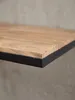 Schräge Perspektive auf die Garderobe mit Ablage. Die Kombination aus warmem Akazienholz und mattschwarzem Metallgestell wirkt modern und industriell._#sku_SAFWL6.354# Produktbild-Vorschau