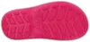 The bottom view of a pink Crocs rain boot. Produktbild-Vorschau