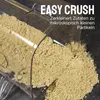 A blender container pouring finely ground powder onto a dark surface. Produktbild-Vorschau