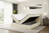 A bedroom scene with a bed featuring an open storage compartment. Produktbild-Vorschau