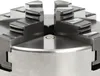 A close-up view of a metal lathe chuck with four jaws. Podgląd zdjęcia produktu