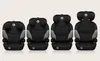 Four car seats of increasing size are displayed side-by-side against a plain white background. Produktbild-Vorschau
