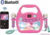 A pink karaoke machine with two microphones and a smartphone displaying a music app. Produktbild-Vorschau