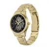 A close-up studio shot of a gold Armani Exchange men's watch with a black dial. Voir les images du produit