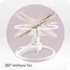 A baby swing with a circular graphic indicating 360-degree rotation. Anteprima dell’immagine prodotto