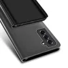 A close-up shot of a black flip case for a smartphone, showing the camera module. Produktbild-Vorschau