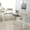 An L-shaped standing desk with office equipment. Voir les images du produit
