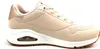 A side view of a single beige sneaker against a white background. Produktbild-Vorschau